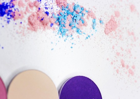 Beautiful makeup shadows scattered on white. Dry textures for professional make-up.の写真素材