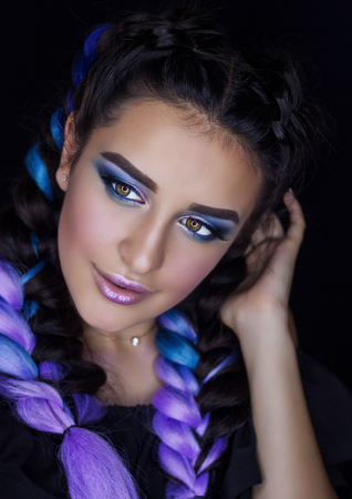Beautiful brunette with kanekalon and professional makeup