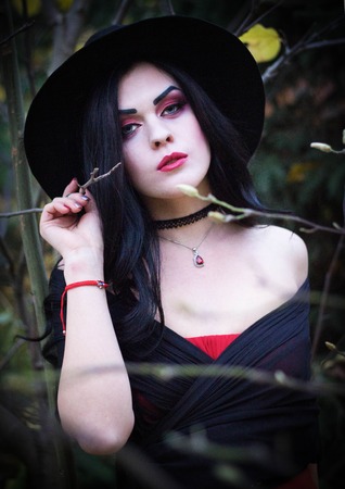 Professional makeup. The image of a witch at the feast of all saints. Halloween.の写真素材