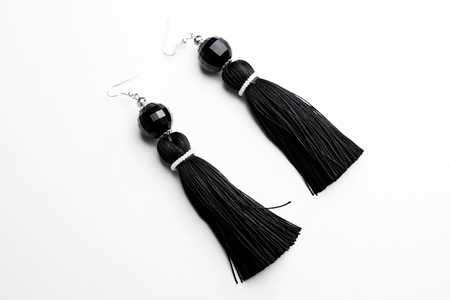 Pair of black spinel diamond earrings isolated on white.の写真素材