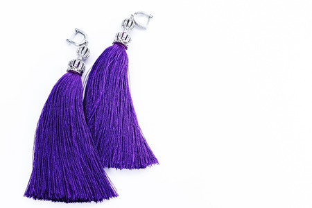 Sergi-tassels made of silk thread and jewelry on a white background. Handmade.の写真素材