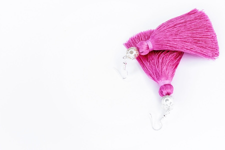 Sergi-tassels made of silk thread and jewelry on a white background. Handmade.の写真素材