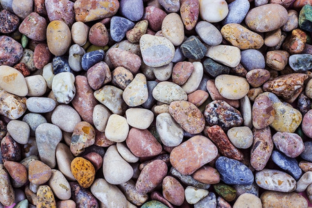 Many sea stones of different color and size. Smooth stone. Pebbles.の写真素材