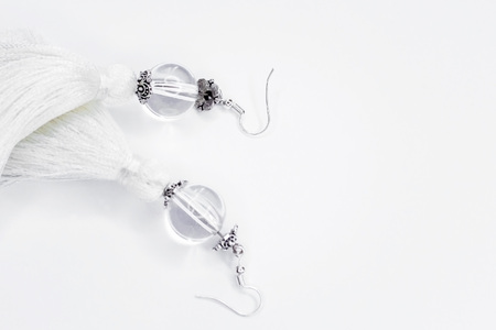 Sergi-tassels made of silk thread and jewelry on a white background. Handmade.の写真素材