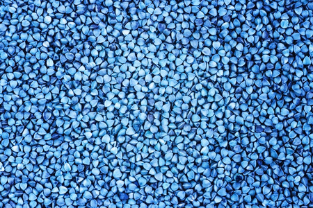 Background of dried products buckwheat blue, texture of buckwheat seeds blue.の写真素材