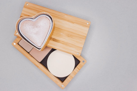 Different cosmetics for make-up for valentine day. Professional cosmetics on a gray background, background or texture for cosmetics.の写真素材