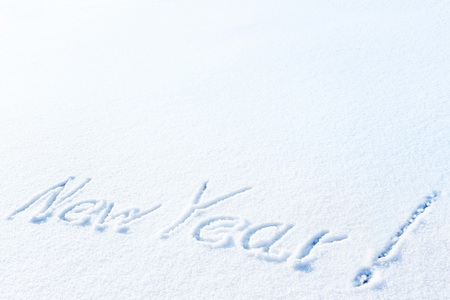Wood inscription Happy New Year close up with snow. Greeting cardの写真素材