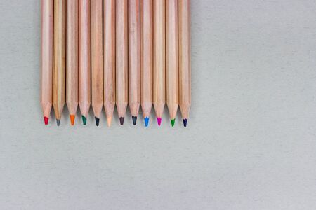 Pencils on a gray background, stationery theme.の写真素材