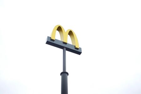 Kiev, Ukraine - November 16, 2019 McDonald's logo on a pillar.のeditorial素材