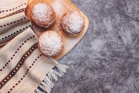 Baking on a gray background and a wooden background.の写真素材