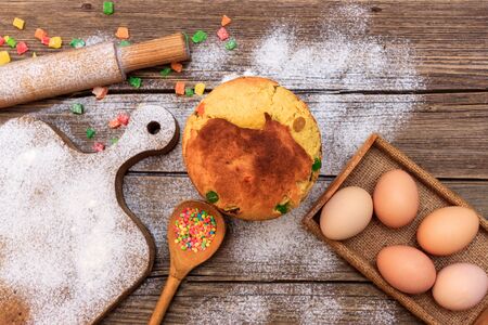 Easter on a wooden table with flourの写真素材