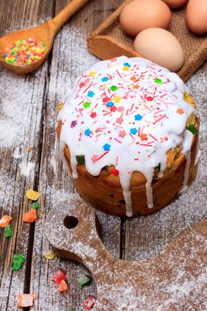 Easter baking decoration on a wooden table.の写真素材