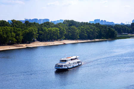 Kiev UKRAINE. August 13 2021. The ship goes along the Dnieper river in the city of Kievのeditorial素材