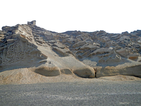 Coast south of Santorini with lava sand. Image with cut sky.の写真素材