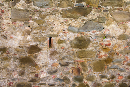 Old medieval walls with stones and mortar. Texture.の写真素材