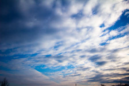 Spring March sky with white fluffy clouds Ukraine