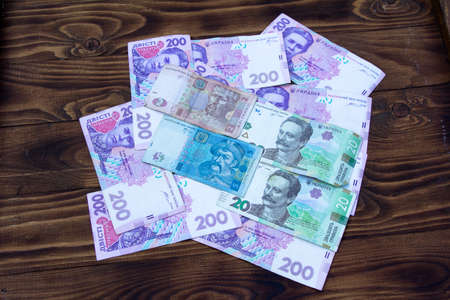 Paper Ukrainian money on a dark backgroundの写真素材