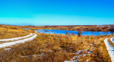 Two dirt roads lead to Lake Ukraineの写真素材