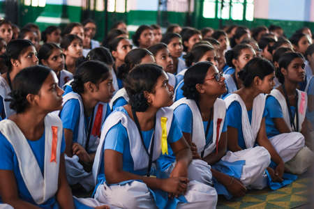Indian School Students. Young Indian school girl students in uniform from rural India attending...
