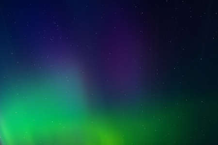 Aurora borealis abstract background. Northern lights in the night sky with the stars. starry sky and Northern lights.の写真素材