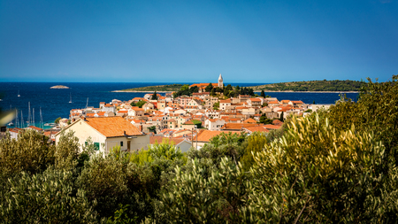 The wonderful old town of the mediterranean town Primosten in Croatiaの写真素材