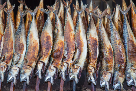 BBQ fish on stick grilled on Oktoberfest Munichの写真素材