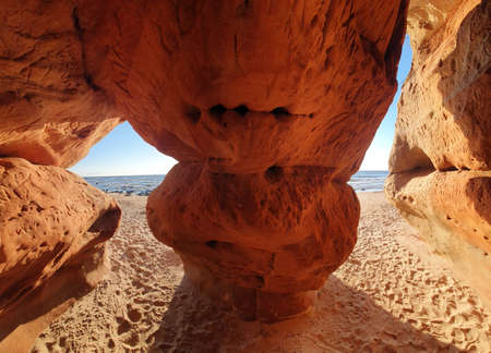 Sandstone cave on the beach