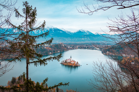 View of Bled Lake during Autumn with Bled Castle and snow and mountains in background, Bled Lake, Sloveniaのeditorial素材