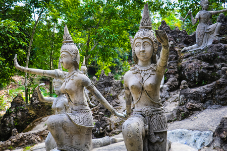 Ancient stone statues in Secret Buddhism Magic Garden, Koh Samui, Thailand. A place for relaxation and meditation.の写真素材