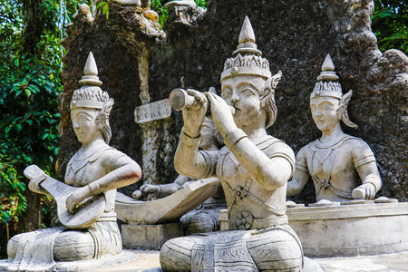 Ancient stone statues in Secret Buddhism Magic Garden, Koh Samui, Thailand. A place for relaxation and meditation.の写真素材