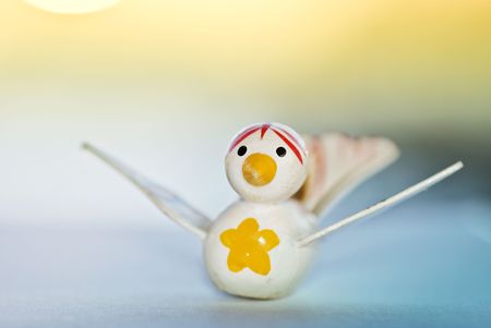 Little old wooden Christmas birdの写真素材