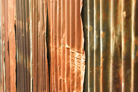 The zinc tile is old and rusty.