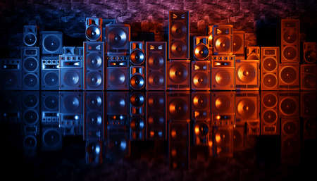 speaker system on a black background in blue and orange lighting, 3d illustration