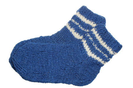 Woolen sock of handwork it is isolated on a white backgroundの写真素材