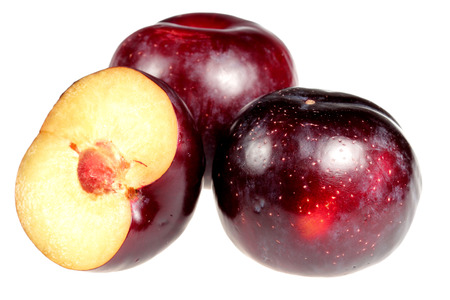 Plums ripe it is isolated on a white backgroundの写真素材