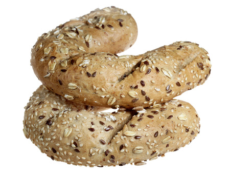 Croissant with sunflower seeds it is isolated on a white backgroundの写真素材