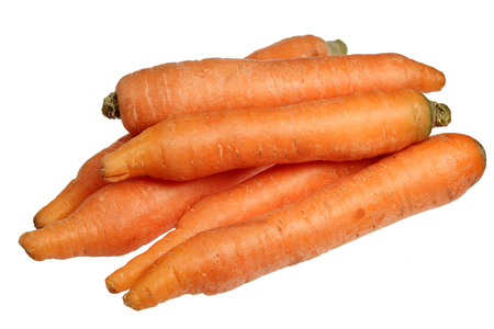 Crude carrots it is isolated on a white backgroundの写真素材