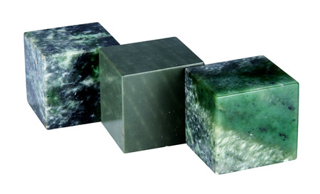 The cube from a mineral nephrite is isolated on a white backgroundの写真素材