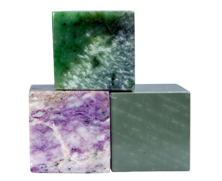 The cube from a mineral also charoit nephrite is isolated on a white backgroundの写真素材