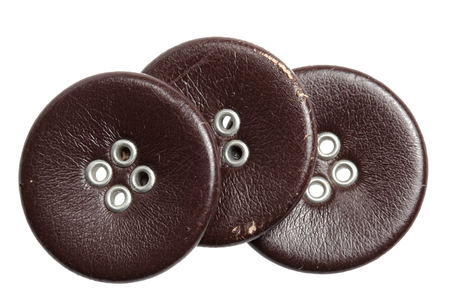 Buttons brown leather it is isolated on a white backgroundの写真素材