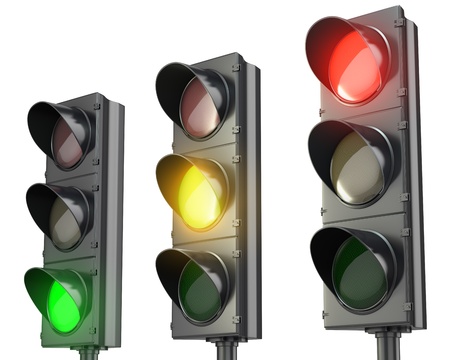 Three traffic lights, red green and yellow, isolated on white background Three traffic lights, red green and yellow, isolated on white background