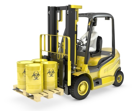Fork lift truck with biohazard barrels, isolated on white backgroundの写真素材