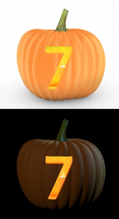 Number 7 carved on pumpkin jack lantern isolated on and white backgroundの写真素材