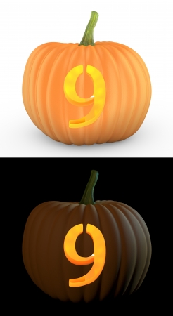 Number 9 carved on pumpkin jack lantern isolated on and white backgroundの写真素材