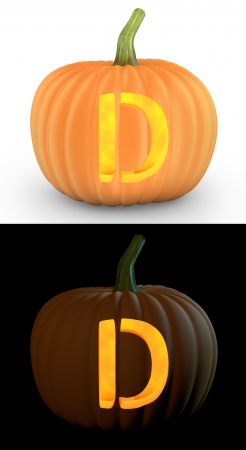 D letter carved on pumpkin jack lantern isolated on and white backgroundの写真素材