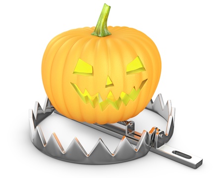 Pumpkin jack lantern in a bear trap isolated on white backgroundの写真素材
