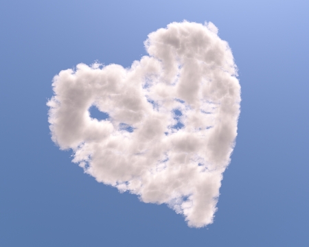 Heart shaped cloud, isolated on blue backgroundの写真素材