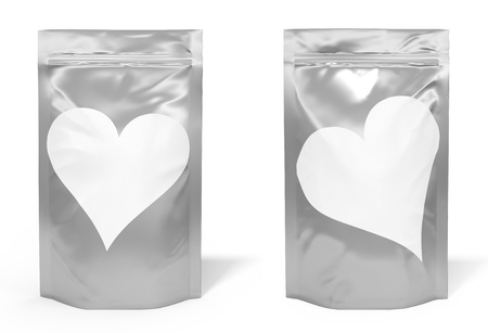 Foil bag package with heart shaped label isolated on white backgroundの写真素材