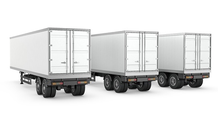 Three blank white parked semi trailers, isolated on white backgroundの写真素材