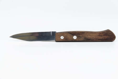 Knife with wooden handle isolated on a white background. Kitchen knife.の写真素材